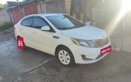 KIA Rio III рестайлинг, 2013 год, 550 000 рублей, 13 фотография
