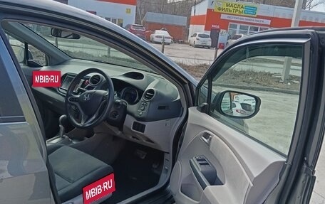 Honda Insight II рестайлинг, 2009 год, 1 100 000 рублей, 12 фотография