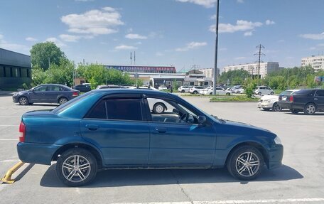 Mazda Familia, 1999 год, 235 000 рублей, 8 фотография