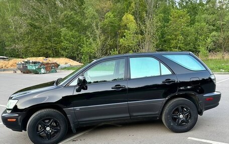 Lexus RX IV рестайлинг, 2002 год, 900 000 рублей, 10 фотография
