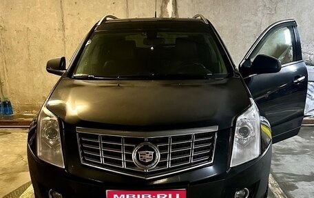 Cadillac SRX II рестайлинг, 2014 год, 1 710 000 рублей, 1 фотография