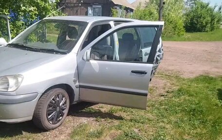 Toyota Raum I, 1997 год, 350 000 рублей, 2 фотография