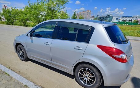 Nissan Tiida, 2010 год, 735 000 рублей, 9 фотография