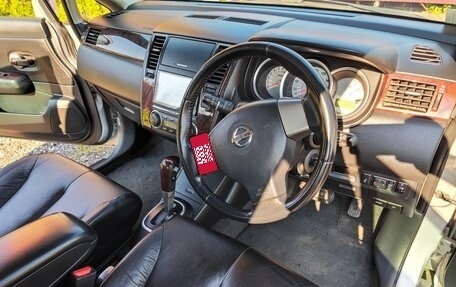 Nissan Tiida, 2010 год, 735 000 рублей, 13 фотография