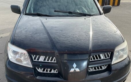 Mitsubishi Outlander III рестайлинг 3, 2006 год, 750 000 рублей, 1 фотография