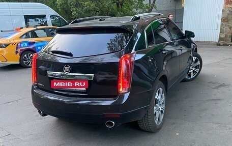 Cadillac SRX II рестайлинг, 2011 год, 1 000 000 рублей, 2 фотография