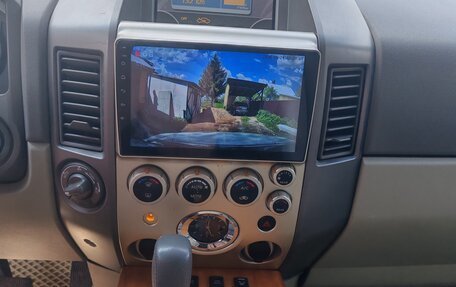 Infiniti QX56, 2005 год, 950 000 рублей, 16 фотография
