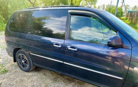 KIA Carnival III, 2005 год, 670 000 рублей, 5 фотография