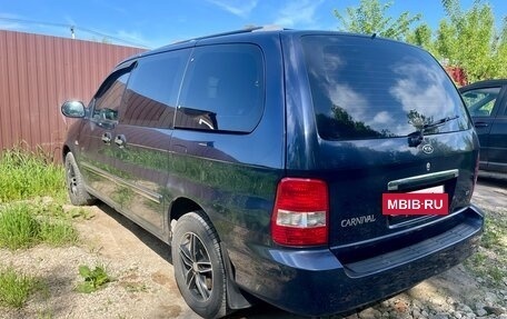 KIA Carnival III, 2005 год, 670 000 рублей, 9 фотография