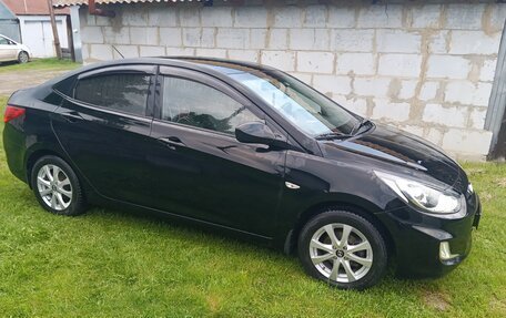 Hyundai Solaris II рестайлинг, 2011 год, 650 000 рублей, 2 фотография