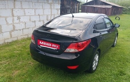 Hyundai Solaris II рестайлинг, 2011 год, 650 000 рублей, 4 фотография