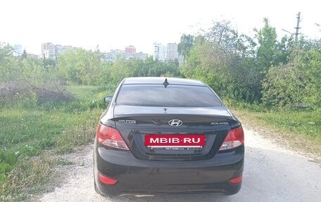 Hyundai Solaris II рестайлинг, 2012 год, 590 000 рублей, 3 фотография