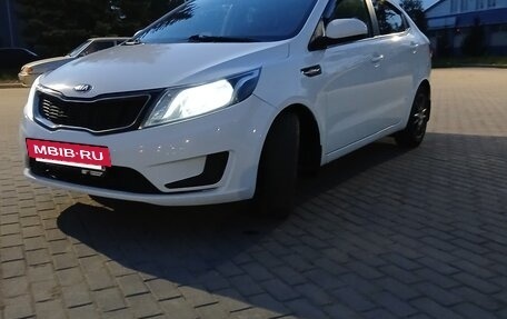 KIA Rio III рестайлинг, 2013 год, 850 000 рублей, 20 фотография