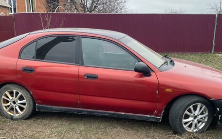 Mitsubishi Carisma I, 1997 год, 230 000 рублей, 4 фотография