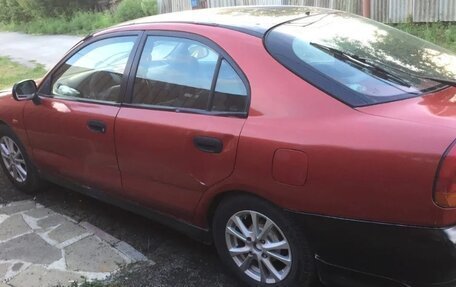 Mitsubishi Carisma I, 1997 год, 230 000 рублей, 6 фотография