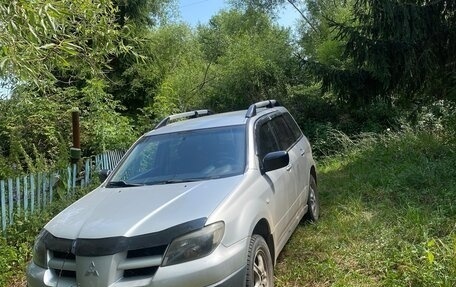 Mitsubishi Outlander III рестайлинг 3, 2003 год, 650 000 рублей, 39 фотография