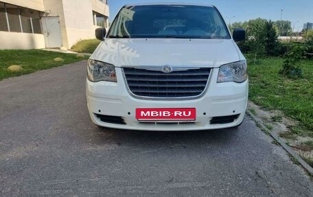 Chrysler Town & Country V рестайлинг, 2007 год, 1 430 000 рублей, 1 фотография
