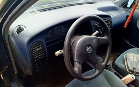 Nissan Primera II рестайлинг, 1992 год, 50 000 рублей, 11 фотография