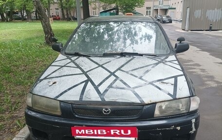 Mazda 323, 1998 год, 172 600 рублей, 7 фотография