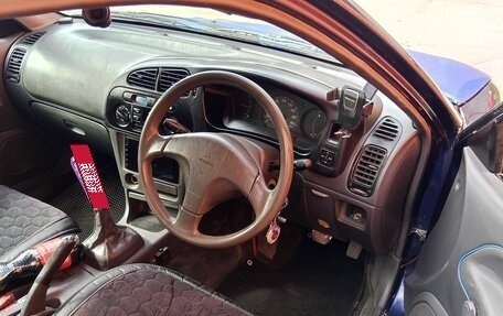 Mitsubishi Mirage VI рестайлинг, 1998 год, 220 000 рублей, 10 фотография