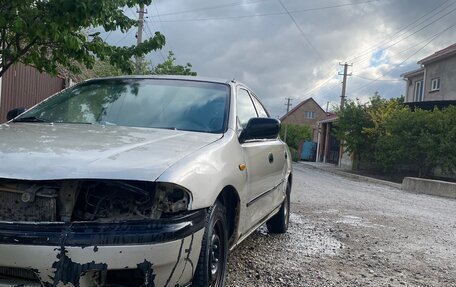 Mazda 323, 1998 год, 55 000 рублей, 6 фотография