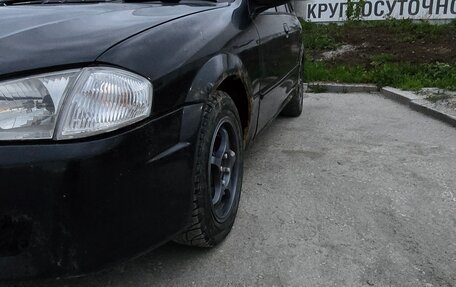 Mazda Familia, 1998 год, 290 000 рублей, 7 фотография