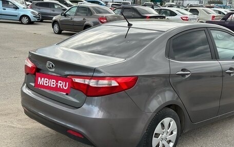 KIA Rio III рестайлинг, 2013 год, 749 000 рублей, 21 фотография