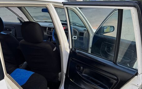 Mazda Demio III (DE), 1997 год, 230 000 рублей, 26 фотография