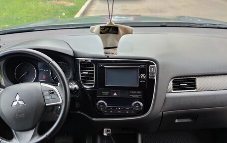 Mitsubishi Outlander III рестайлинг 3, 2012 год, 1 525 000 рублей, 13 фотография