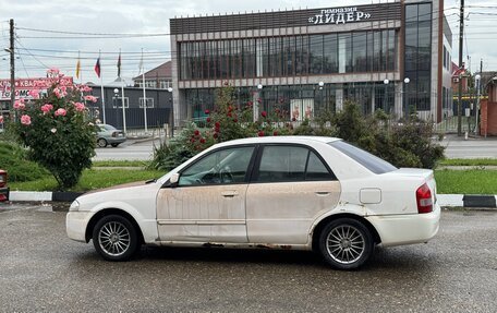 Mazda Familia, 1998 год, 100 000 рублей, 4 фотография