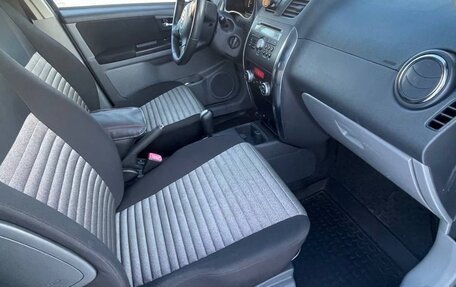 Suzuki SX4 II рестайлинг, 2013 год, 900 000 рублей, 19 фотография