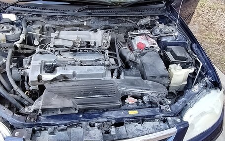 Mazda 323, 2001 год, 400 000 рублей, 18 фотография