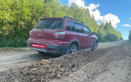Mitsubishi Outlander III рестайлинг 3, 2005 год, 700 000 рублей, 18 фотография