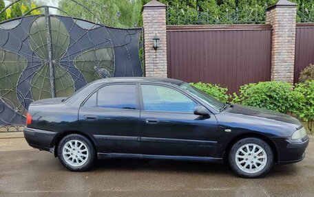 Mitsubishi Carisma I, 2002 год, 295 000 рублей, 4 фотография