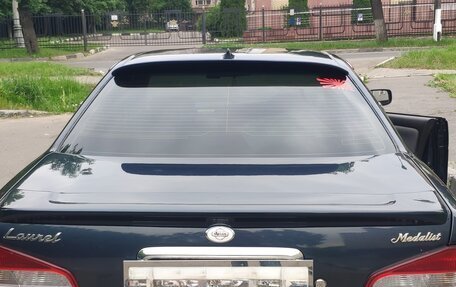 Nissan Laurel VIII, 2000 год, 550 000 рублей, 4 фотография