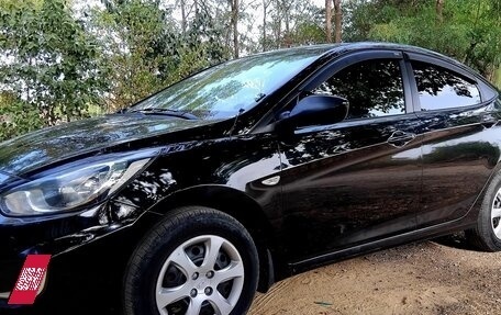 Hyundai Solaris II рестайлинг, 2011 год, 675 000 рублей, 4 фотография