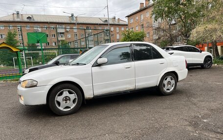 Mazda Familia, 1999 год, 200 000 рублей, 13 фотография