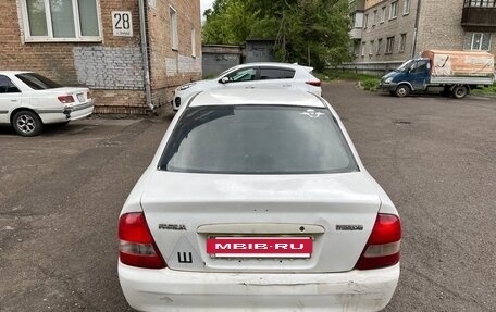 Mazda Familia, 1999 год, 200 000 рублей, 8 фотография
