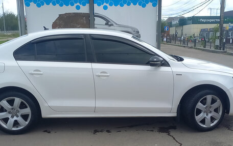 Volkswagen Jetta VI, 2013 год, 900 000 рублей, 7 фотография