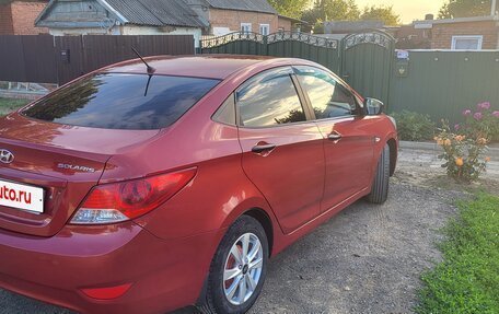 Hyundai Solaris II рестайлинг, 2011 год, 820 000 рублей, 5 фотография
