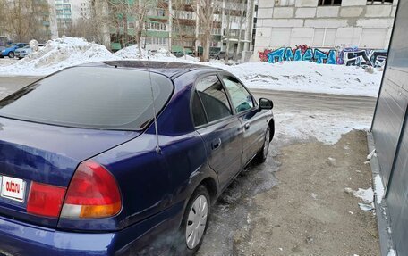 Mitsubishi Carisma I, 1997 год, 360 000 рублей, 5 фотография