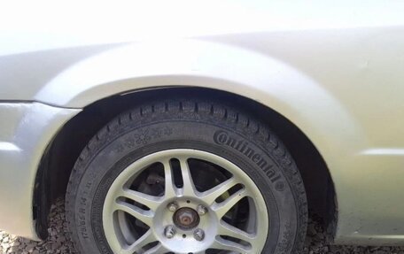 Mazda Familia, 1999 год, 230 000 рублей, 13 фотография