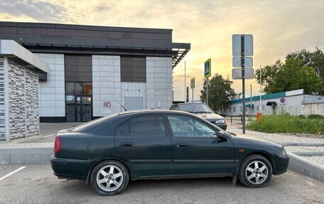 Mitsubishi Carisma I, 1999 год, 100 000 рублей, 4 фотография