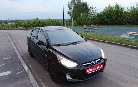 Hyundai Solaris II рестайлинг, 2011 год, 650 000 рублей, 2 фотография