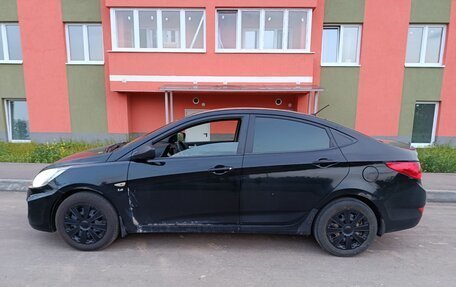 Hyundai Solaris II рестайлинг, 2011 год, 650 000 рублей, 13 фотография