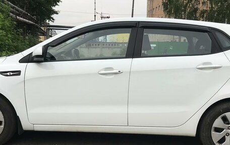 KIA Rio III рестайлинг, 2013 год, 980 000 рублей, 19 фотография