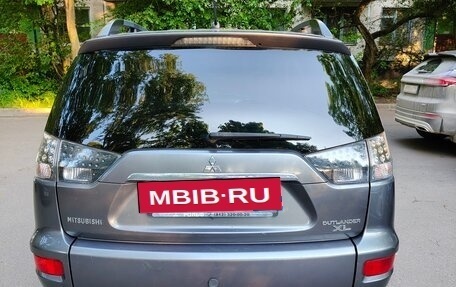 Mitsubishi Outlander III рестайлинг 3, 2011 год, 910 000 рублей, 4 фотография