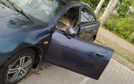 Mazda 323, 1997 год, 178 000 рублей, 4 фотография