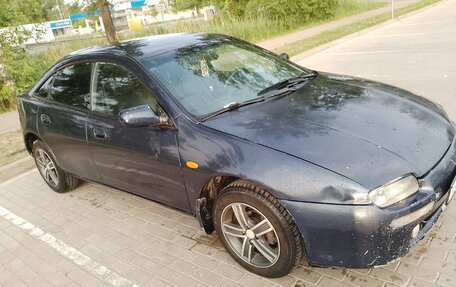 Mazda 323, 1997 год, 178 000 рублей, 9 фотография