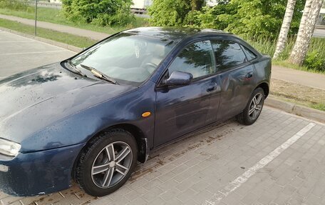 Mazda 323, 1997 год, 178 000 рублей, 11 фотография
